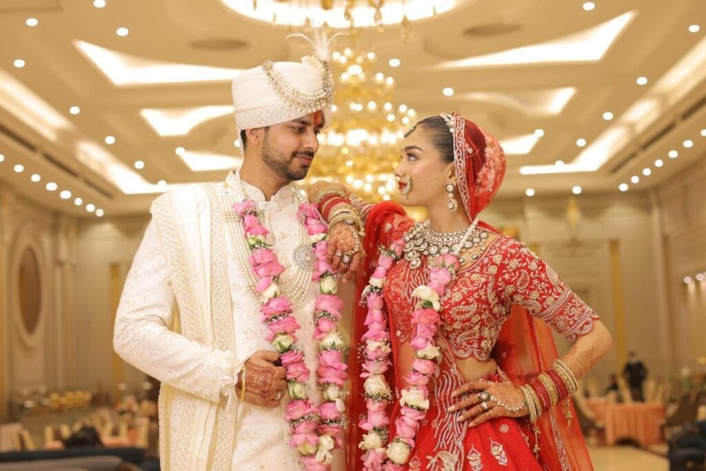 Bride and groom sharing a genuine smile during their wedding.