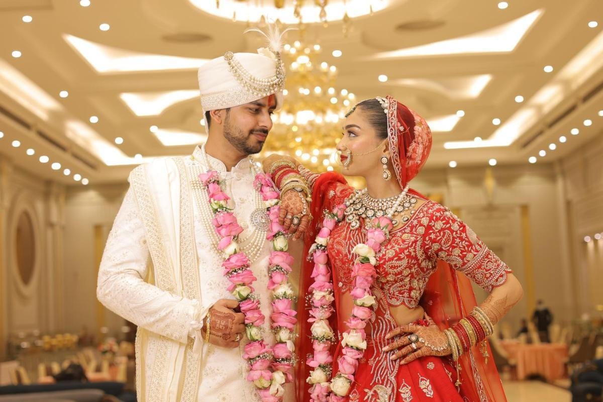 Bride and groom sharing a genuine smile during their wedding.
